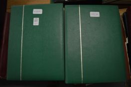 Two albums containing World stamps.