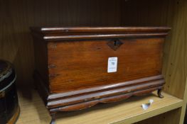 A small pine coffer style box.