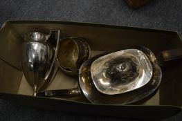 Silver teapot and other items.