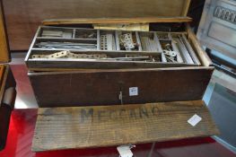 A box containing a quantity of Meccano items.