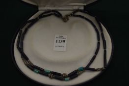 Decorative necklace, boxed.