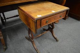 A miniature sofa table.