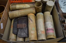 The cardboard outer sleeves for military orders.