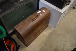 An old sewing machine and a typewriter.