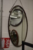 Three various oval mirrors.