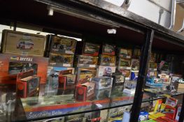 Quantity of boxed die-cast models of cars, vans etc.