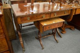 A mahogany sofa table.