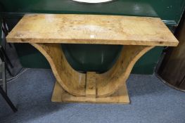 An Art Deco style burr wood console table.