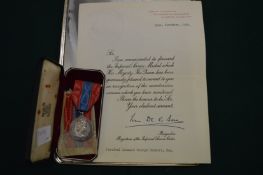 An Imperial Service medal, boxed together with certificate.