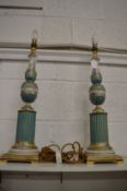 A pair of decorative porcelain table lamps.