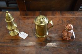 An early brass pedestal castor together with another brass castor and a copper pedestal castor.