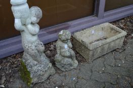 A figural composite bird bath support, similar fountain and a rectangular trough.