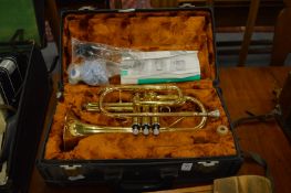 A cased Yamaha cornet.