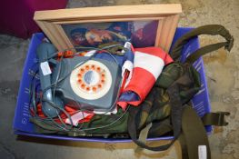 An old telephone and other items.