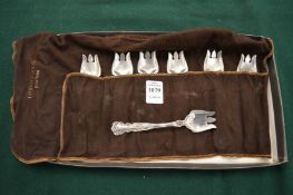 Tiffany & Co, seven silver pastry forks with Tiffany & Co cloth storage bag.