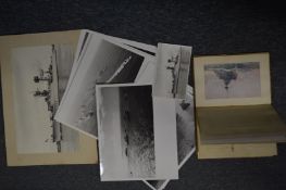 A book of postcards and other photographic items relating to battleships.
