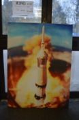 The launch of a space ship, colour photographic print on canvas.