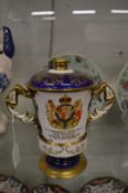 An Aynsley porcelain limited edition twin handled loving cup and cover made to commemorate the