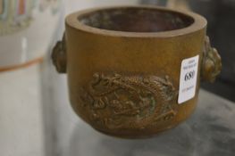 A Chinese bronze twin handled censer.