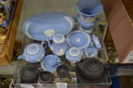A group of miniature Wedgwood Jasperware to include tea ware and a pedestal vase.