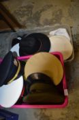 A large collection of military, naval and other hats.
