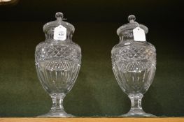 A good large pair of cut glass pedestal vases and covers.