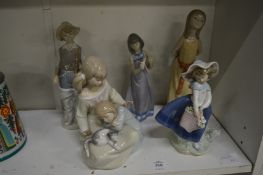 Five Lladro figures.