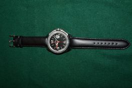 A gentlemans Candino wristwatch.