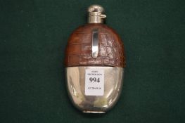 A plated an leather hip flask.