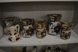 A group of ironstone jugs etc.