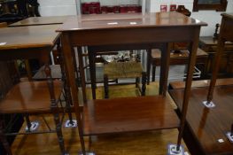 An inlaid mahogany two-tier occasional table.