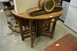 An oak occasional table.