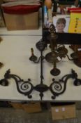 A heavy cast brass four branch chandelier and another light fitting.