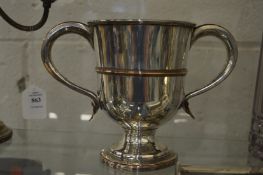 A Sheffield plate twin handled trophy cup.
