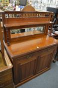 A Victorian walnut chiffonier.