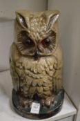 A cast iron owl door stop.