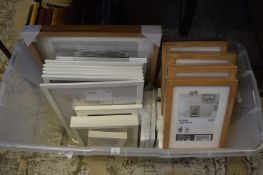 A box of unused picture frames.
