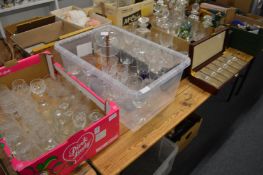 A large quantity of household and decorative glassware to include decanters, vases, drinking glasses