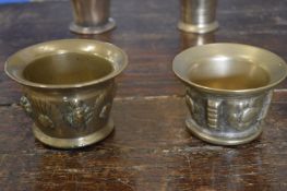 Two early bronze pestles.