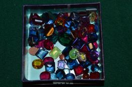 Box of colourful stones.