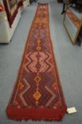 An unusual long runner, 470cm x 50cm.