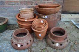 Quantity of terracotta plant pots.