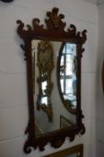 A good Georgian style walnut fretwork framed mirror with Prince of Wales cresting.
