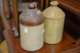 Two old stoneware bottles.