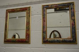 Two mirrors with floral decorated frames.