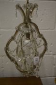 A small Venetian style cut glass chandelier.