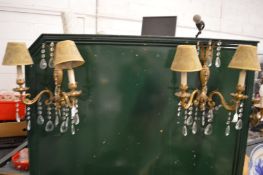 A pair of ormolu and cut glass twin branch wall lights.