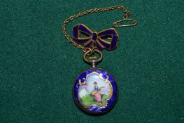 An enamel decorated ladies fob watch with matching bow shaped hanger (faults).