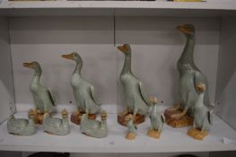 A collection of Chinese celadon glazed ducks.