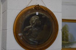 A Victorian beadwork circular picture depicting a young child, in a gilt frame.